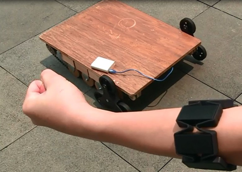 The gesture armband worn on the forearm